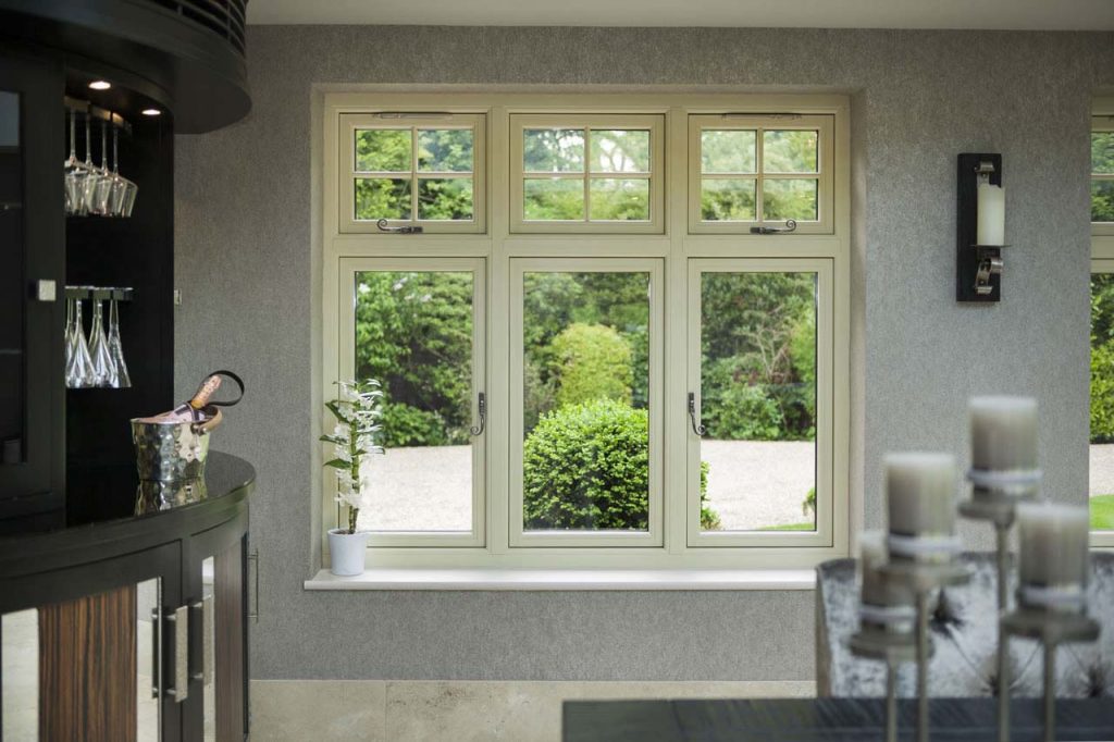 Cream Residence 9 windows looking out into a pruned garden